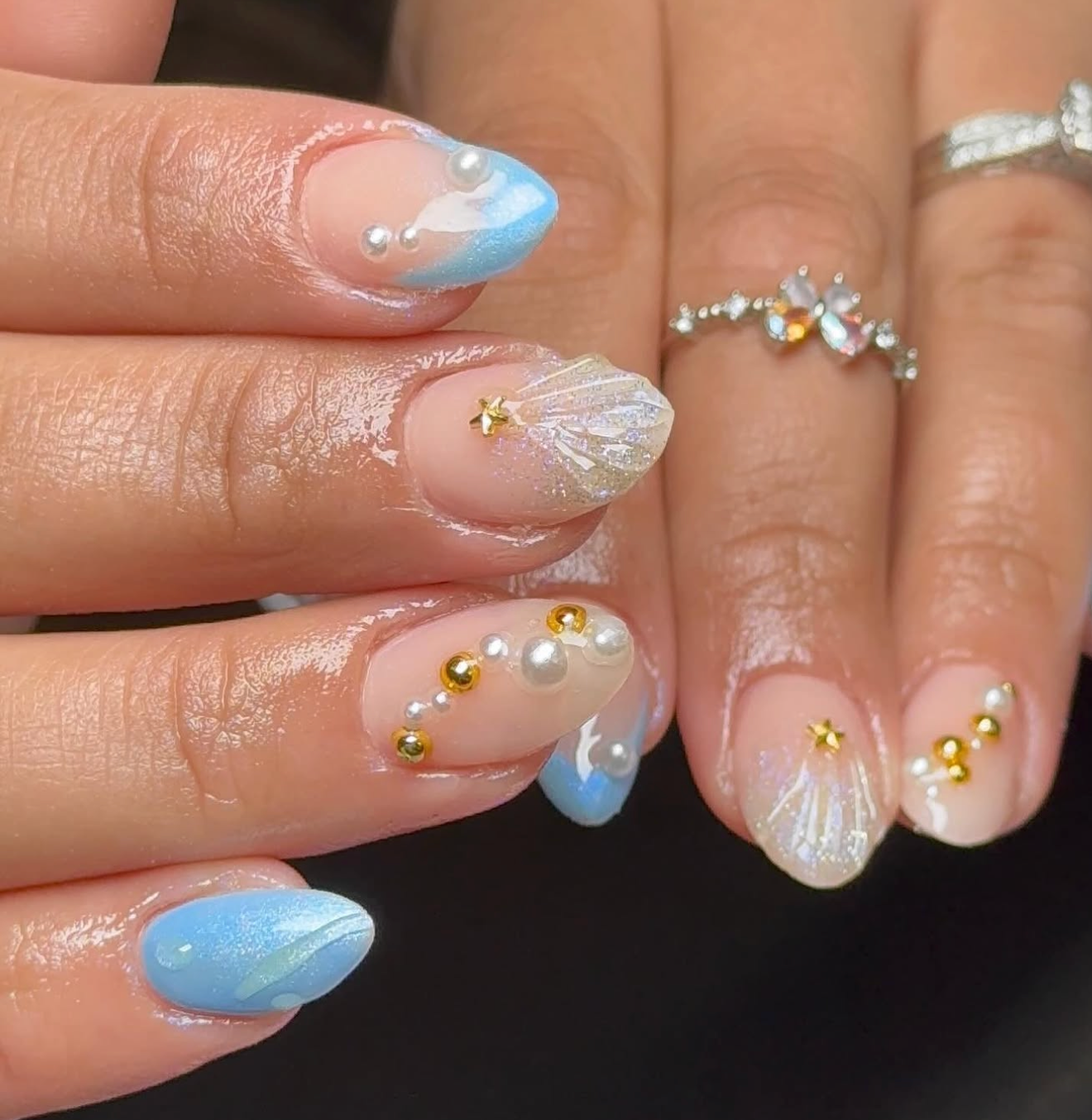Blue shell nail design by Victoria